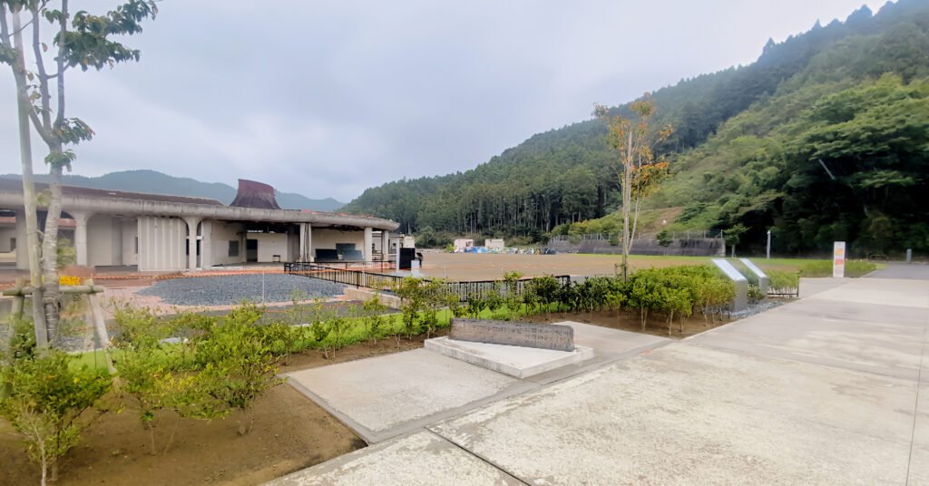 Okawa School Tsunami Memorial – Stories of Hope and Resilience Okawa Elementary School site entrance with preserved ruins and memorial grounds in Ishinomaki.