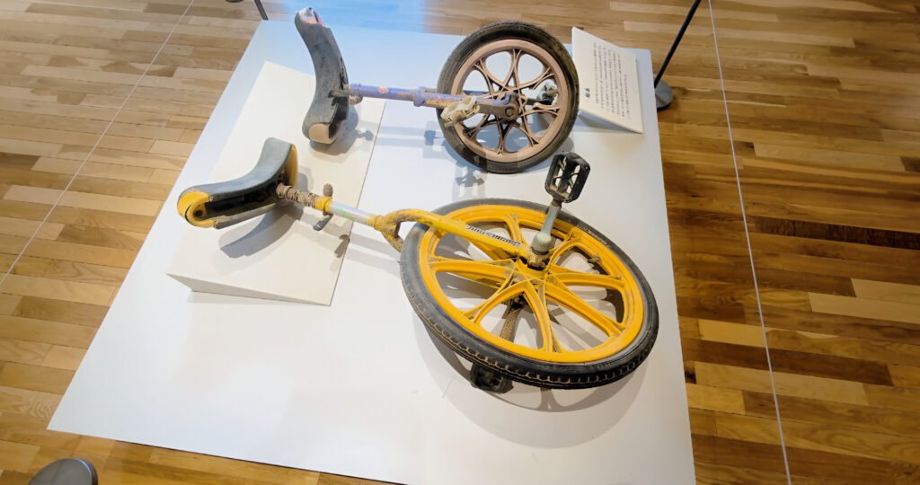 Okawa School Tsunami Memorial – Stories of Hope and Resilience Rusted bicycle displayed at Okawa Tsunami Memorial Hall, symbolizing the children lost in the 2011 tsunami.